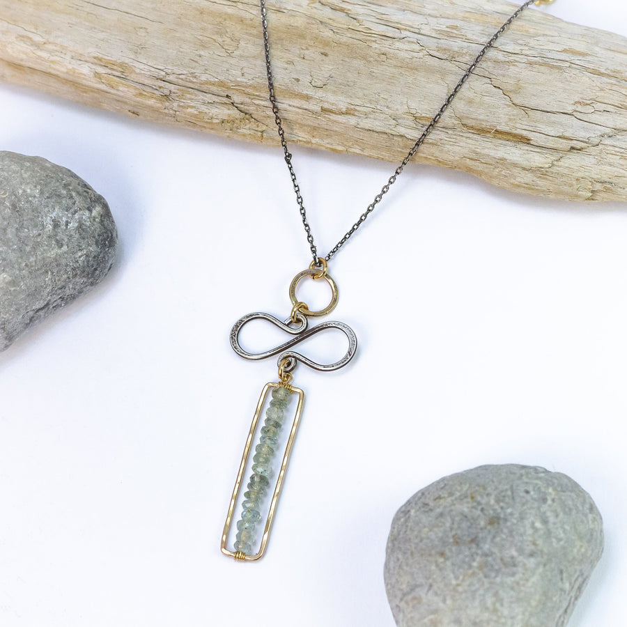 handmade mixed metal moss aqua feminist necklace laura j designs